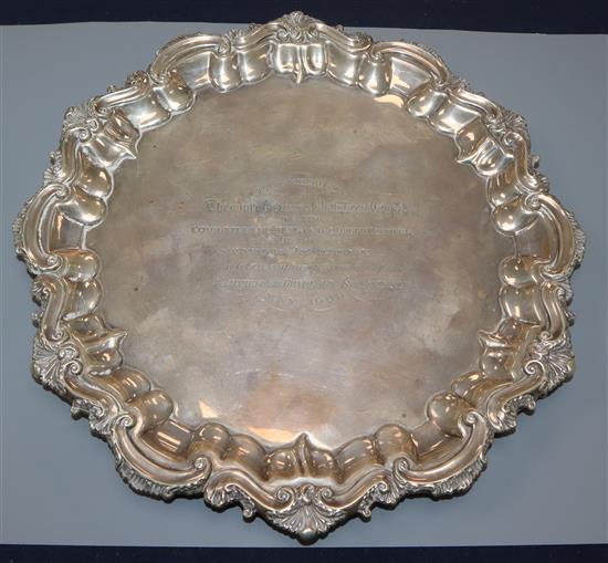 A Victorian silver waiter with shell and scroll border, Birmingham 1899, 18oz, 27.5cm.